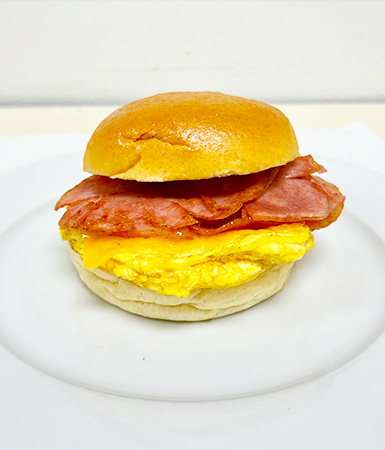 Turkey Bacon, Egg, Cheddar Brioche AX